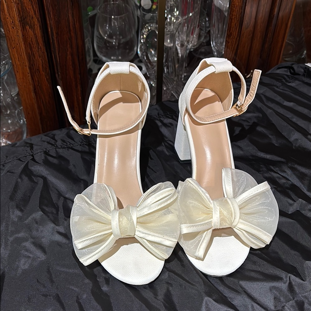 Elegant classy wedding shoe. White Bow Heeled Sandals.